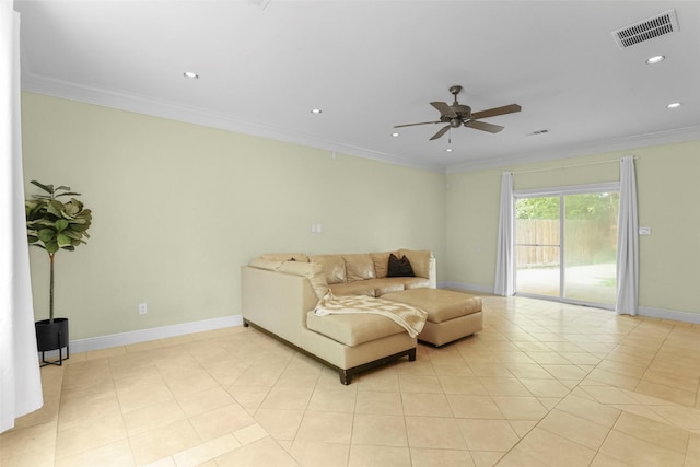 tiled living room with ceiling fan and ornamental molding