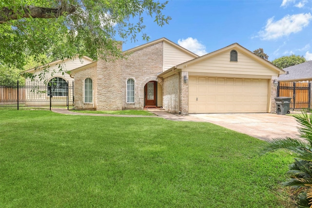 view of front of house featuring a garage and a front lawn