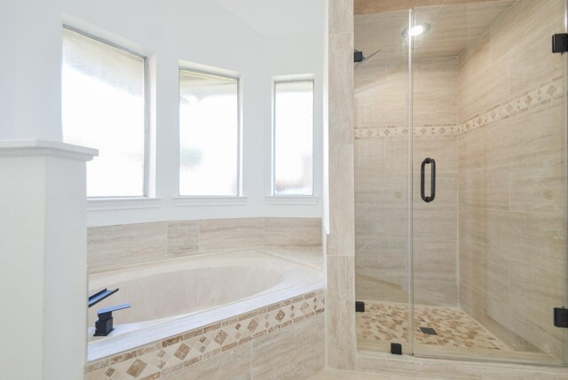 bathroom with independent shower and bath