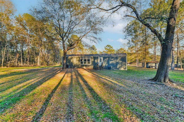 exterior space with a front lawn