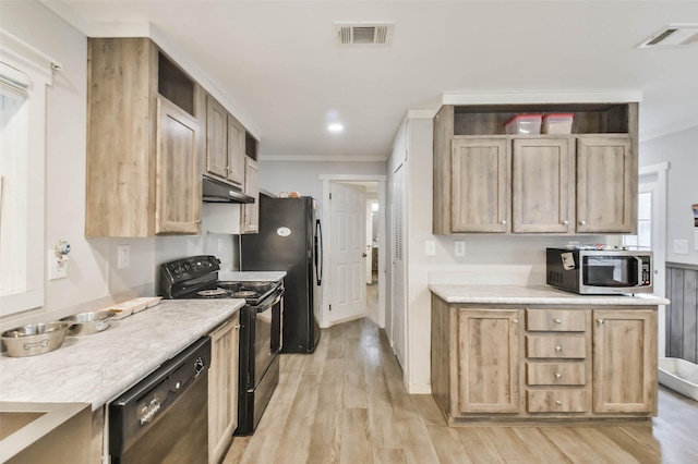 kitchen featuring light hardwood / wood-style floors, light brown cabinets, black appliances, and ornamental molding