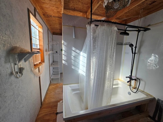 bathroom featuring walk in shower