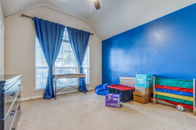 carpeted bedroom featuring vaulted ceiling and ceiling fan