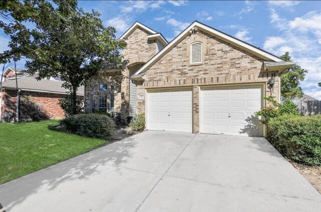 view of front of home with a front lawn