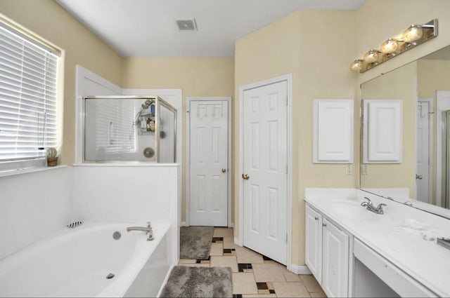 bathroom featuring plus walk in shower and vanity