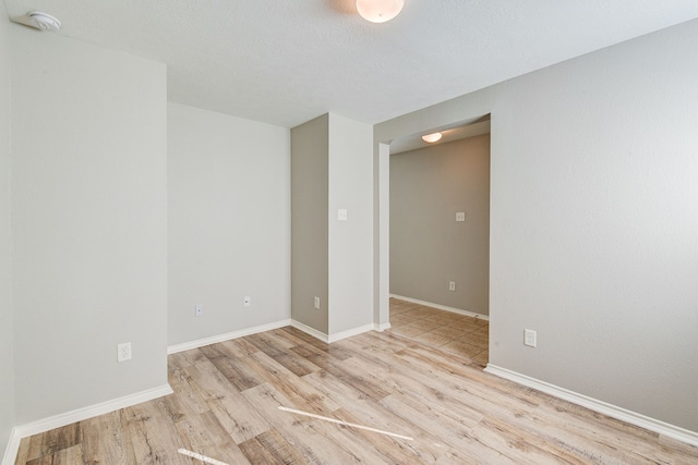 empty room with light wood-type flooring