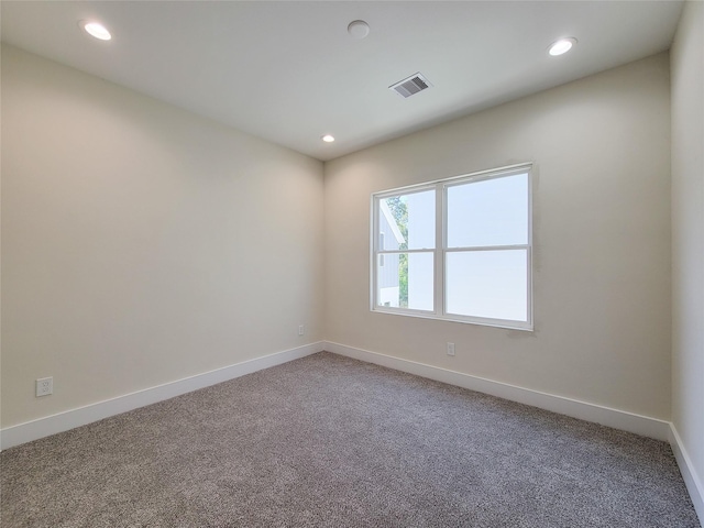 view of carpeted spare room