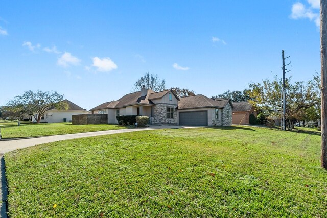 single story home with a garage and a front yard