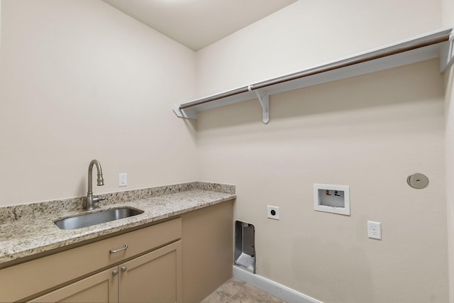 clothes washing area featuring hookup for an electric dryer, hookup for a washing machine, cabinets, sink, and light tile patterned flooring