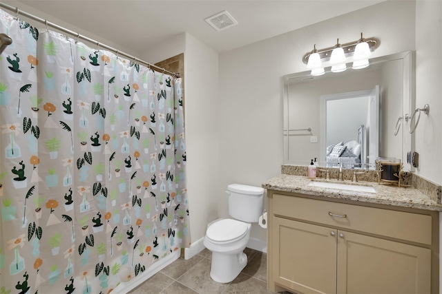 bathroom featuring tile patterned flooring, toilet, vanity, and a shower with shower curtain