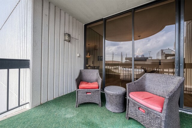 view of patio with a balcony