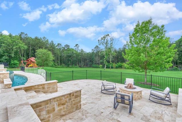 view of patio with an outdoor fire pit