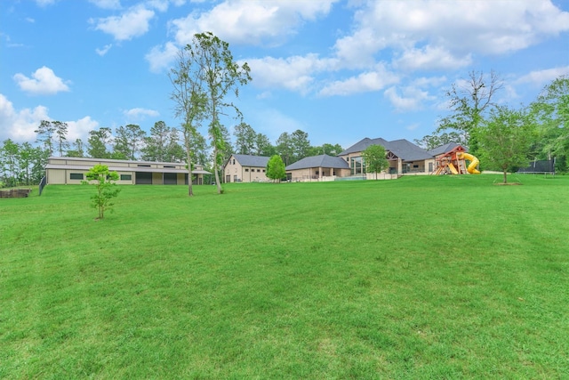 view of yard with a playground