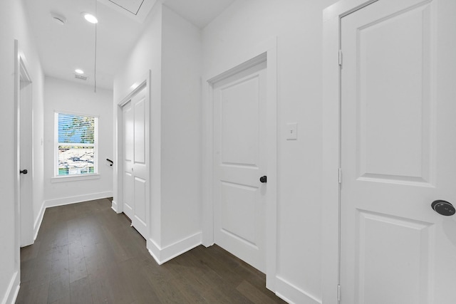 corridor featuring dark wood-type flooring