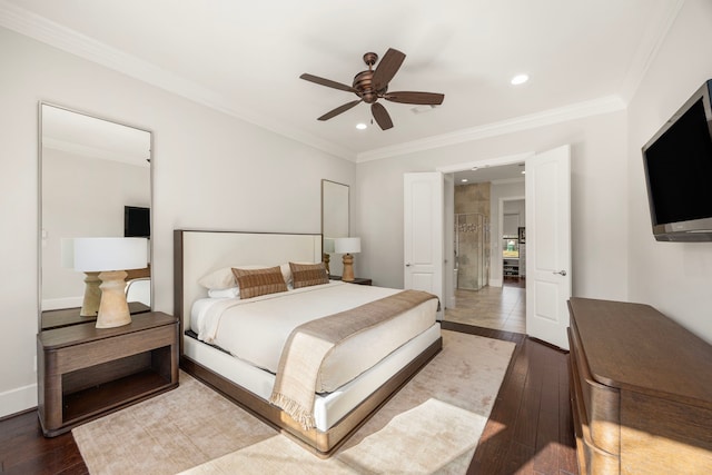 bedroom with ceiling fan, dark hardwood / wood-style flooring, and ornamental molding