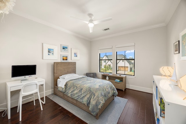 bedroom featuring ceiling fan, dark wood-type flooring, and ornamental molding