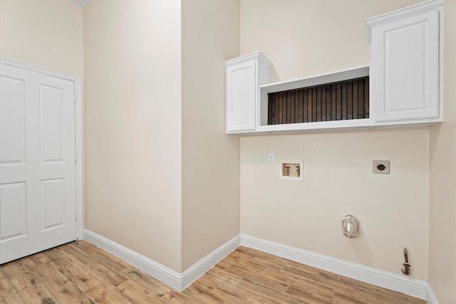 laundry area featuring light hardwood / wood-style floors, electric dryer hookup, and hookup for a washing machine