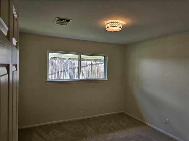 empty room with carpet floors