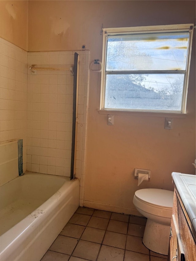 full bathroom featuring tile patterned flooring, vanity, plenty of natural light, and toilet