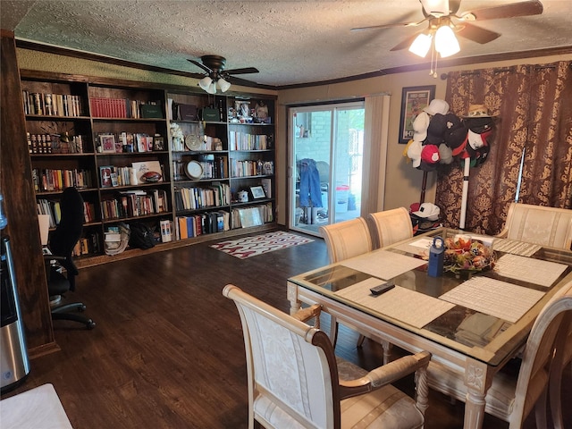 dining area with hardwood / wood-style floors, a textured ceiling, and ceiling fan