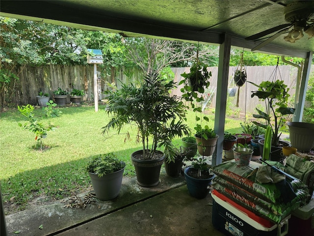 view of yard featuring ceiling fan