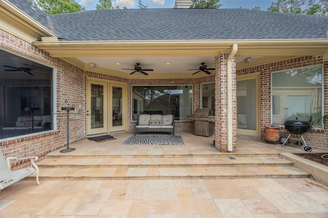 view of patio with area for grilling, french doors, and ceiling fan