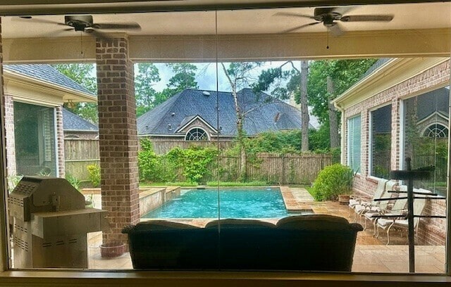 4418 Greens Court Way, Houston, TX 77339 - view of swimming pool featuring ceiling fan, a fenced backyard, and a patio