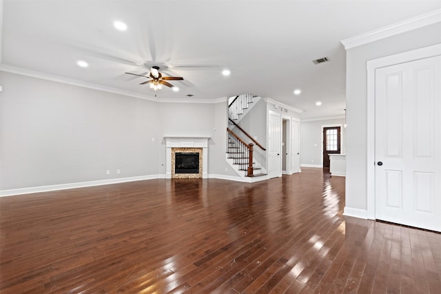 unfurnished living room featuring crown molding, ceiling fan, and dark wood-type flooring