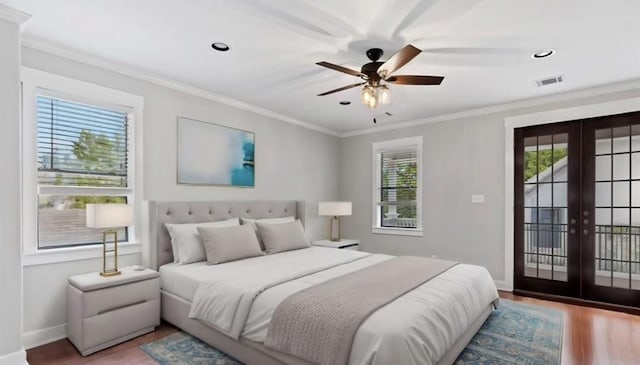 bedroom featuring ceiling fan, french doors, crown molding, access to outside, and hardwood / wood-style flooring