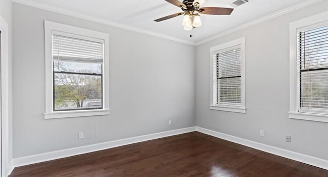 empty room with dark hardwood / wood-style floors, ceiling fan, and crown molding