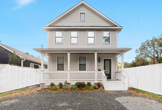 view of front of property featuring covered porch