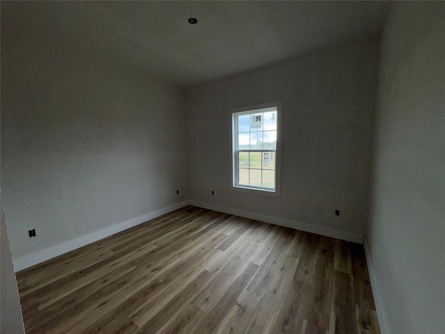 unfurnished room featuring light hardwood / wood-style flooring