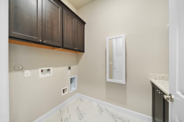 laundry room with hookup for a washing machine, cabinets, and hookup for an electric dryer