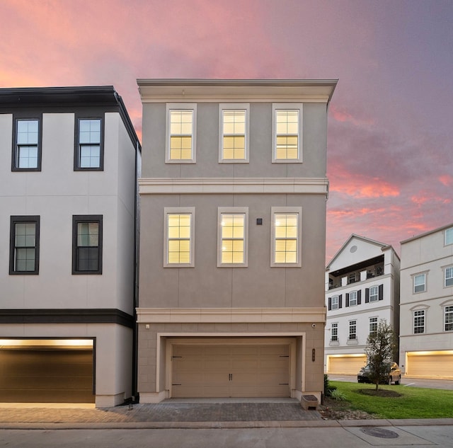 view of front of property featuring a garage