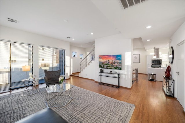 living room with wood-type flooring