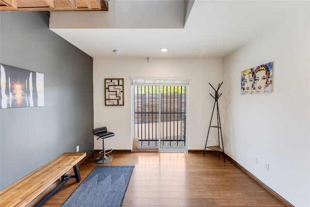 workout area featuring hardwood / wood-style floors