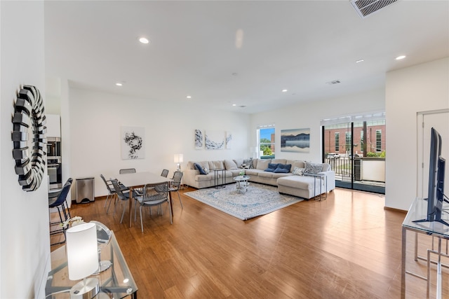 living room featuring light wood-type flooring