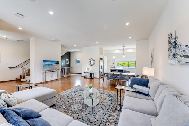 living room with light hardwood / wood-style floors