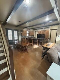 17332 Pintail Dr, Flint, TX 75762 - living room with beamed ceiling, finished concrete flooring, and stairs