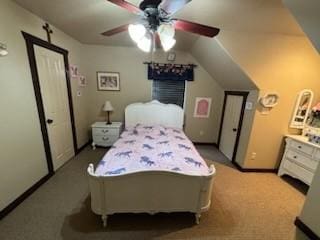 bedroom with ceiling fan, light colored carpet, and lofted ceiling