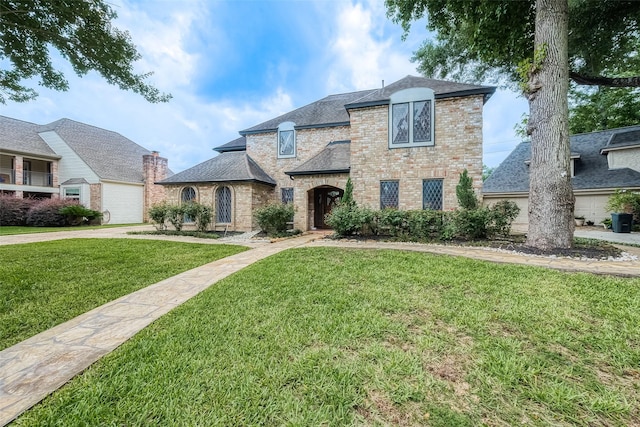 view of front of home with a front yard