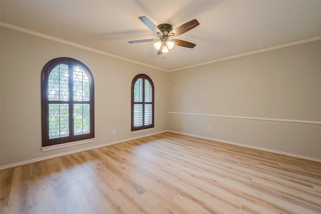 unfurnished room with ceiling fan, ornamental molding, a textured ceiling, and light hardwood / wood-style flooring