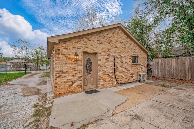 view of outbuilding featuring ac unit