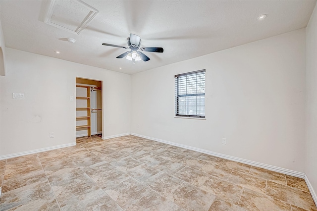 empty room with ceiling fan