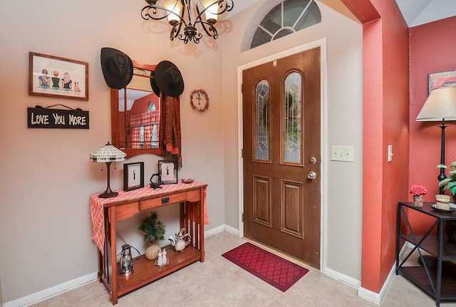 foyer featuring an inviting chandelier