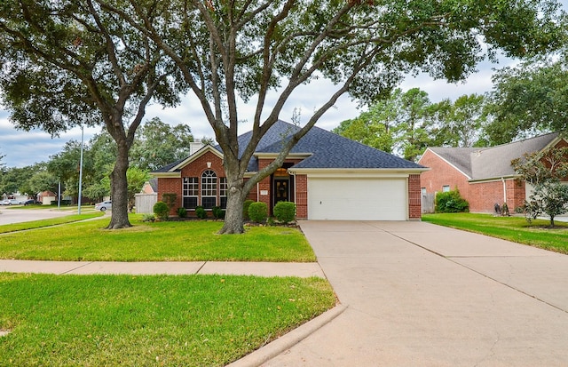 ranch-style home featuring a front yard and a garage