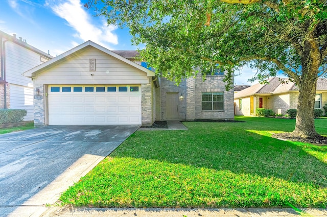 view of front facade with a garage and a front lawn