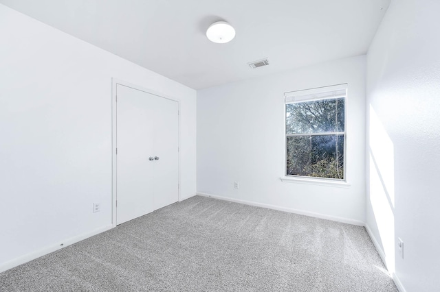 view of carpeted spare room