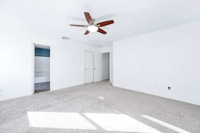 unfurnished bedroom with carpet floors and ceiling fan