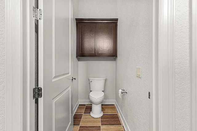 bathroom featuring toilet